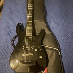 Guitar With Amp And Cable