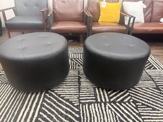 Set of 2 Black Round Tufted Ottomans