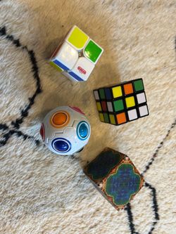 Rubiks cube and other fidget toys lot
