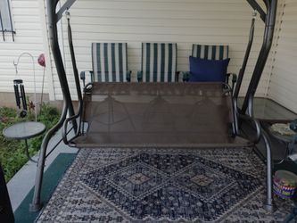 PATIO SWING WITH TABLES ATTACHED