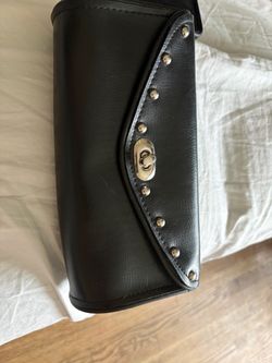 Black leather motorcycle windshield bag and a Harley Davidson trifold men’s 💳