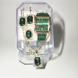 4 pcs Green emerald jewelry set - gold tone watch and necklace with green gems, featuring a faux leather band.  Set contains necklace , watch , ring ,