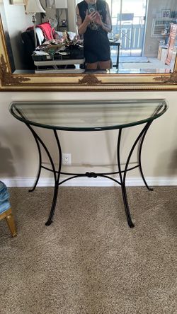 Iron base entryway indoor/outdoor table with heavy glass top