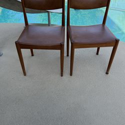A Pair Of Teak MCM Chairs