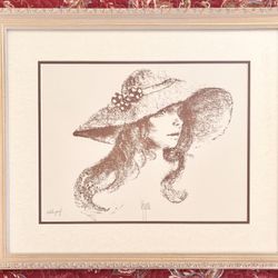 Woman In Sunhat Framed Print