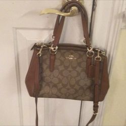 Coach Signature Logo