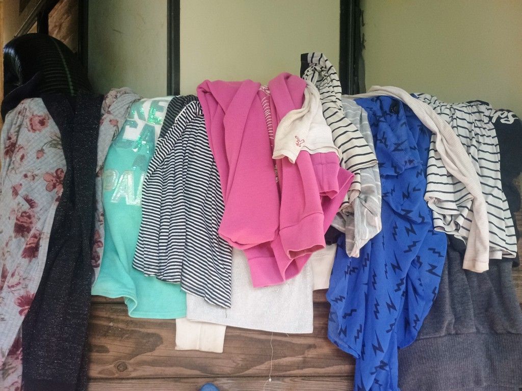 Lot of 14 women's size sm/med. shirts