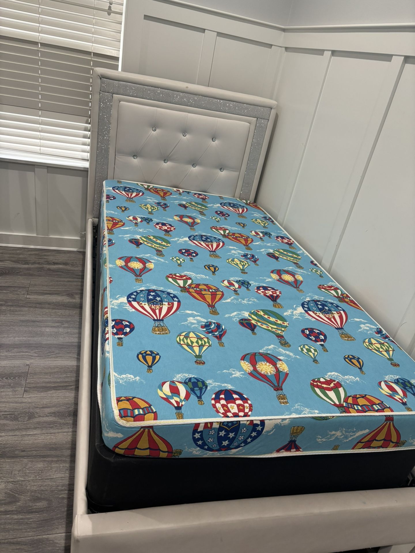 Twin bed with mattress and box spring