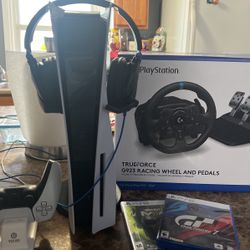 PlayStation 5 And Gaming Steering Wheel 