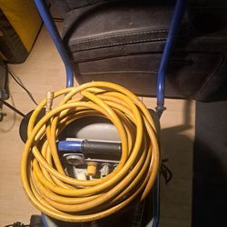 

This is a Michelin oil-lubricated air compressor. Key specifications include: 
5 gallon tank capacity
3 peak HP motor
1.3 running HP
125 max PSI
5.1