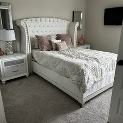 Queen size bedroom set with matching nightstands, dresser, and mirror