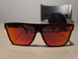 Unisex, Neven Eyewear, (Zero Cool) Matte black frame, Fiery Red/Orange Polarized lenses.  Only worn a few times...