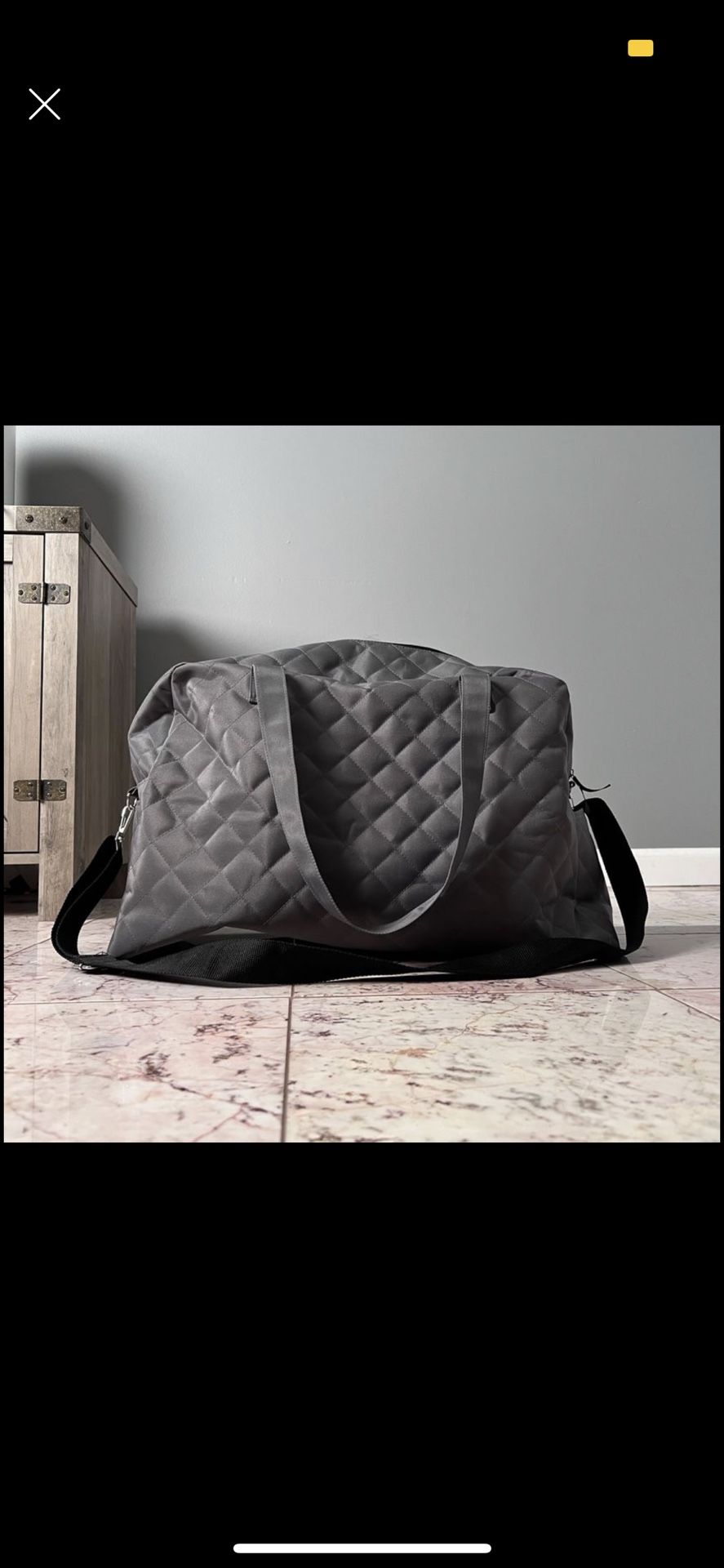 GRAY LARGE DUFFLE BAG WITH BLACK STRAP