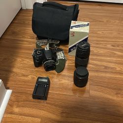 Canon Rebel T5 + 4 lenses, Charger, carrying bag