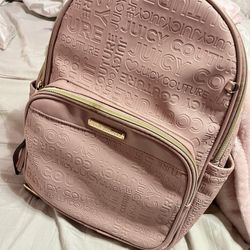 Baby pink Juicy Couture backpack with mini pouch