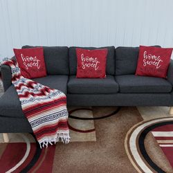 Dark Gray Sectional Sofa from IKEA, in great condition. Delivery available for an additional cost. Great for living room or den. 