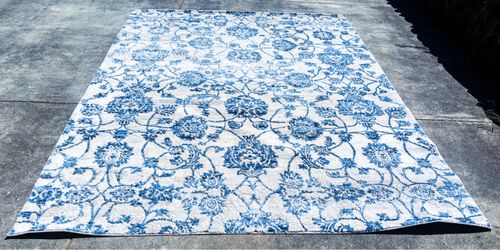 Costco Henley area rug 6’6”x9’6” polyester stain and shed resistant.