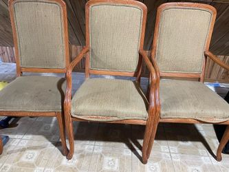 Three wood chairs