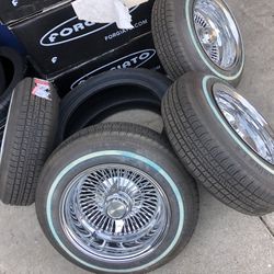 13. INCH WIRE WHEELS AND TIRES 