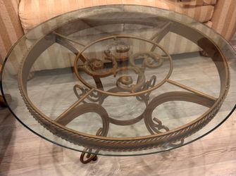 Round glass top coffee table
