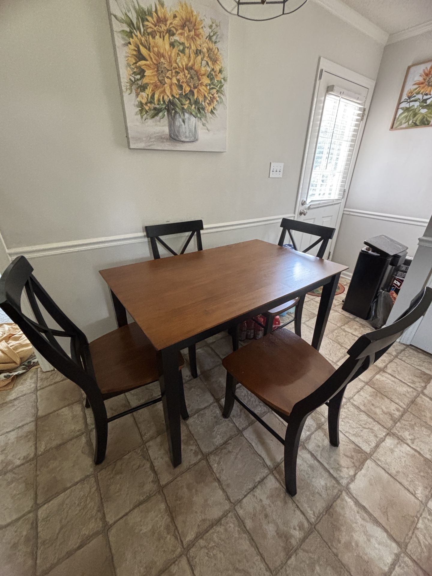Brown solid wood dining table set with four chairs