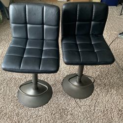 Two adjustable height bar chairs