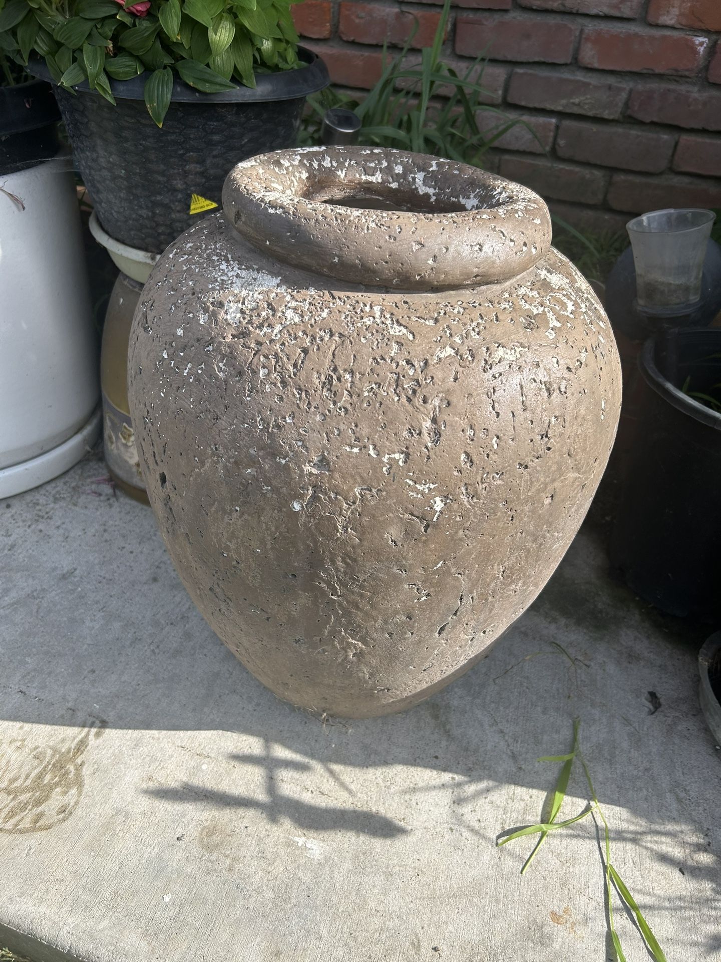 Base for plants or decoration is very heavy, measures 22 high and 14 wide