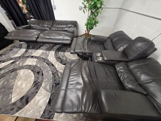 Genuine Leather Power Reclining Sofa Set. Delivery options available