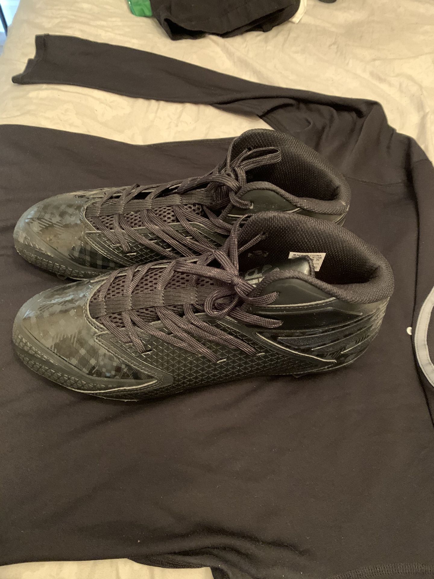 Adidas football or baseball cleats