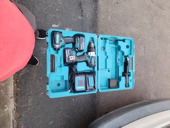 Mikita Hammer Drill And Impact Driver. With Two Batteries.