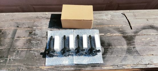High performance ignition coils & spark plugs For most For four cylinder engines a couple of Mazda cars brand new 30$