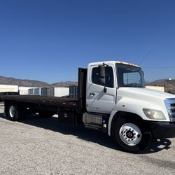 2016 Hino 268 Flatbed Truck 26ft 