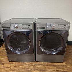 Kenmore  XL Capacity  Electric washer and dryer , comes with a 30-day warranty.