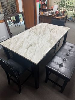 White marble dining room table and chairs set