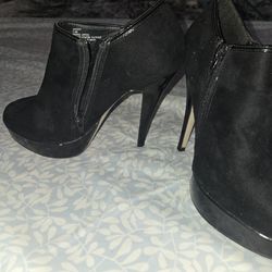 Black swayed booties heels  7 1/2