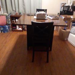 Dinette Table....wine Rack, 2 Shelves On Side, 2 Drawers On Botton, Leaf Folds Down On Both Ends.