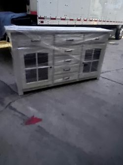 65 inch TV stand and a dresser used in good shape