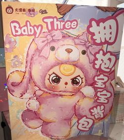 Baby Three Hugging Backpack 400% plus an extra face with a little panda on the cheek