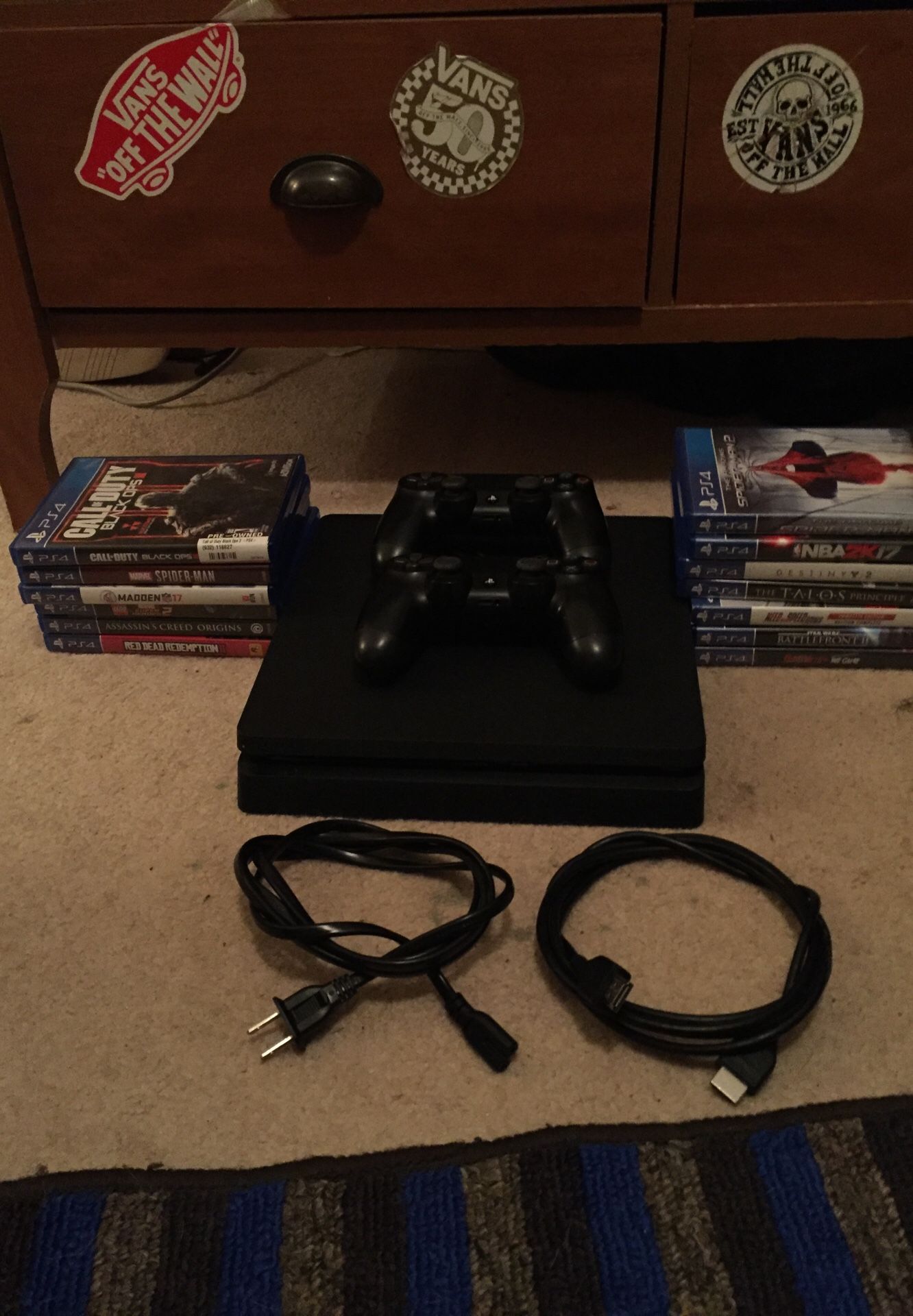 PS4 slim w/t 13 games and 2 controllers,