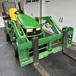 2017 John Deere 1025R W/ Attachments