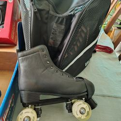 Two pairs of roller skates w/accessories