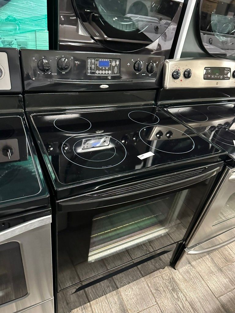 Whirlpool black electric stove with warranty