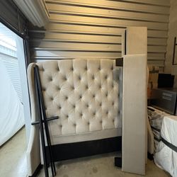 Wingback tufted upholstered bed