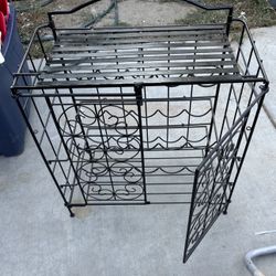 Heavy duty wine rack good shape has attachment to put lock