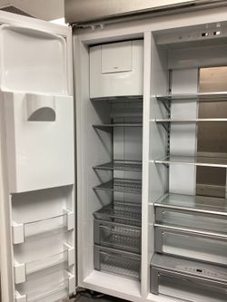 Stainless steel True Stainless Dispenser Refrigerator By Monogram