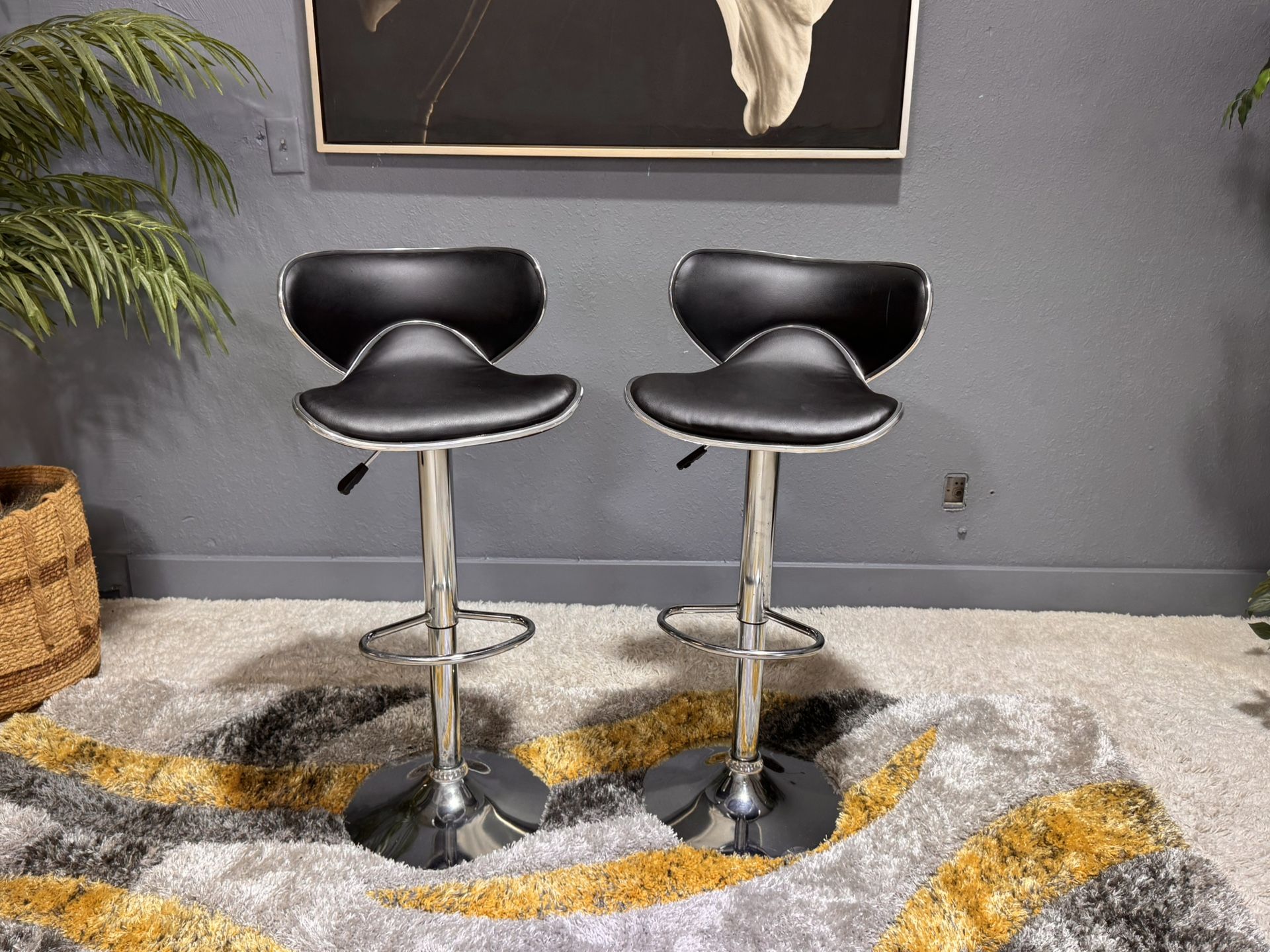 Pair Of Black Leather Adjustable Swivel Barstools