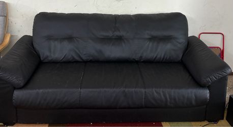 IKEA black faux leather sofa