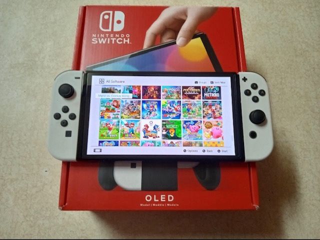 Nintendo Switch Oled With 120 Switch Games