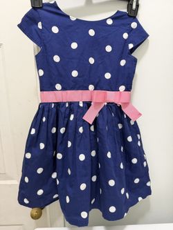 Girl Carter’s blue polka dot dress with pink bow, size 4/5