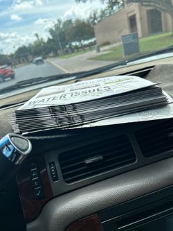 Stack of Local Newspapers of the lowrider convention at IMas McAllen Museum